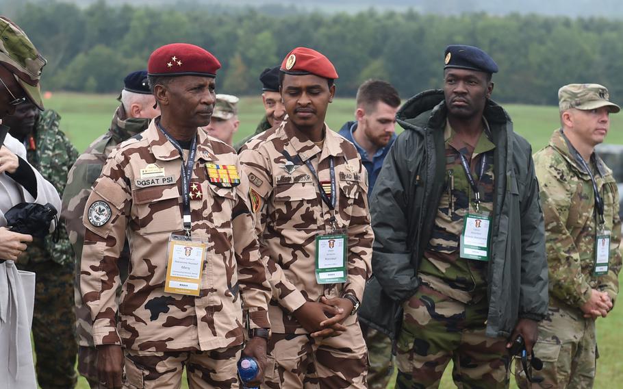 Service members from Chad observe activities on Sept. 14, 2022 at the Vilseck training area. Leaders watched as soldiers from the 2nd Cavalry Regiment completed testing for the Expert Infantryman Badge. 