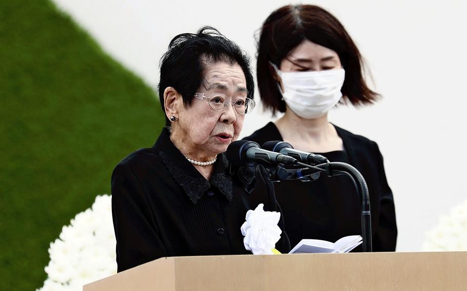 A-bomb survivor Nobuko Oka reads the Commitment of Peace message at a ceremony at Nagasaki Peace Park on Aug. 9, 2021. Oka died in November at the age of 93..