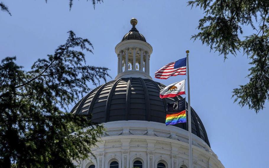 The rainbow flag flies on the main flagpole of the California state Capitol to celebrate LGBTQ Pride month on Monday, June 17, 2019.