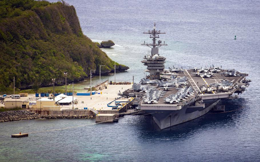 The aircraft carrier USS Theodore Roosevelt moors at Naval Base Guam, May 15, 2020.