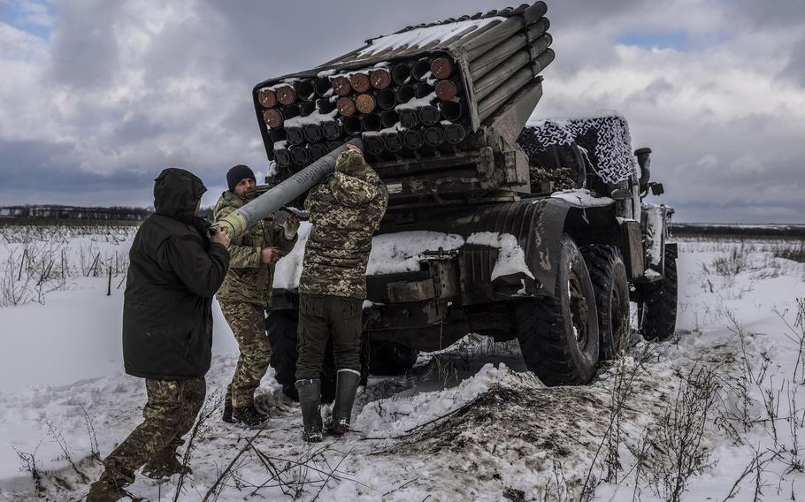 Ukrainian forces load a Grad rocket launcher in Donetsk on Feb. 14, 2023.