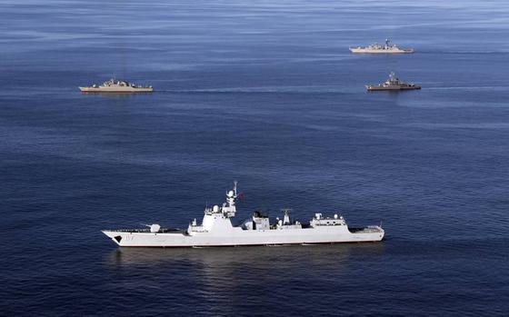 FILE - In this file photo provided by the Iranian Army, warships sail in the Sea of Oman during the second day of joint Iran, Russia and China naval war games on Dec. 28 2019.  Naval forces from China, Iran and Russia — all countries at varying degrees of odds with the United States — are staging joint drills in the Gulf of Oman this week, China’s Defense Ministry has announced. Other countries are also taking part in the “Security Bond-2023” exercises, the ministry said Tuesday, March 14, 2023, without giving details.(Iranian Army via AP, File)