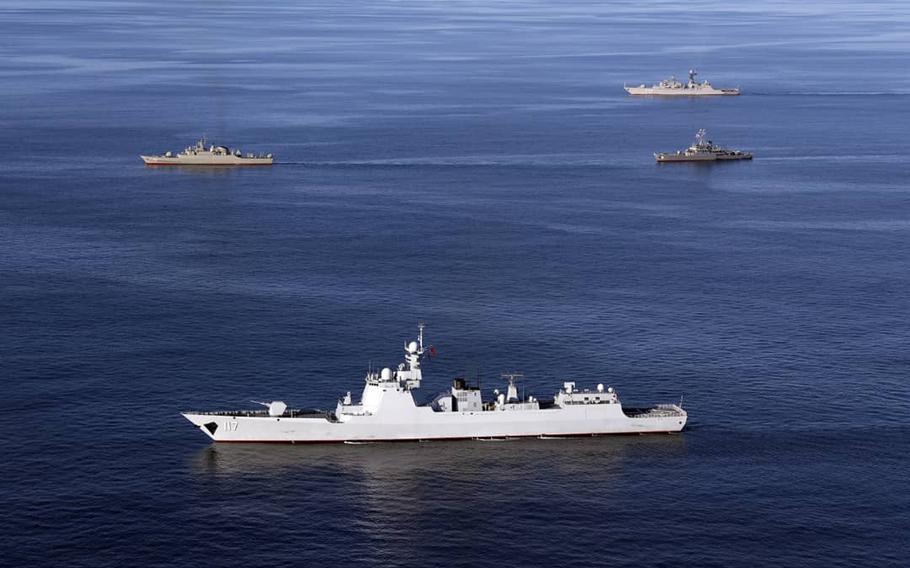 Warships sail in the Sea of Oman during the second day of joint Iran, Russia and China naval war games on Dec. 28 2019.  Naval forces from China, Iran and Russia are staging joint drills in the Gulf of Oman this week, China’s Defense Ministry said.