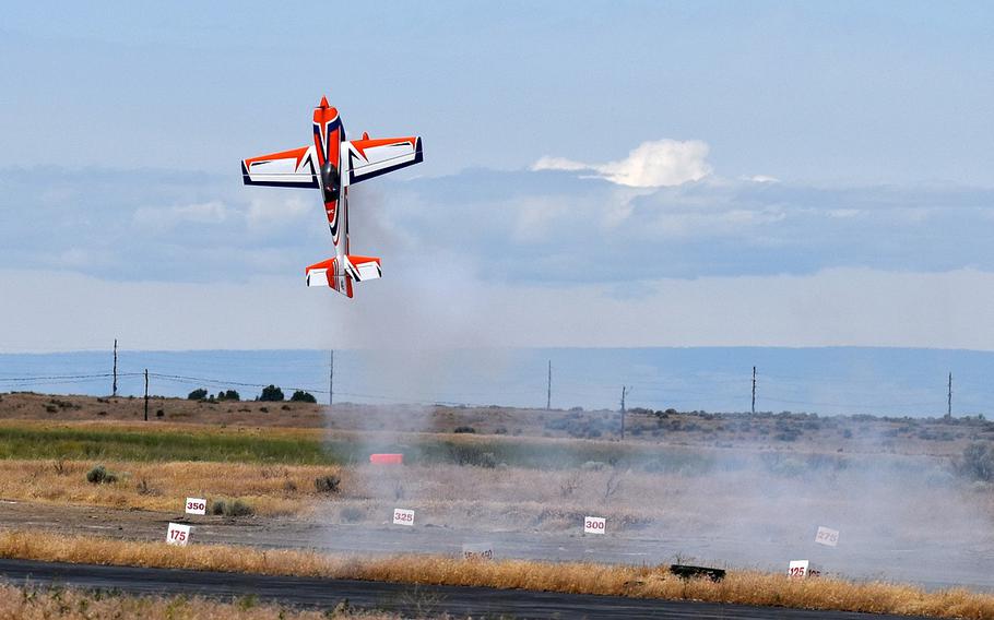 A radio-controlled plane appears to hover above the tarmac at the Moses Lake Airshow Friday.