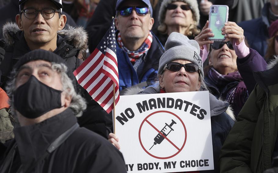 Anti-vaccination activists participate in a rally after a Defeat The Mandates DC march at the Lincoln Memorial in Washington, DC., on Jan. 23, 2022.