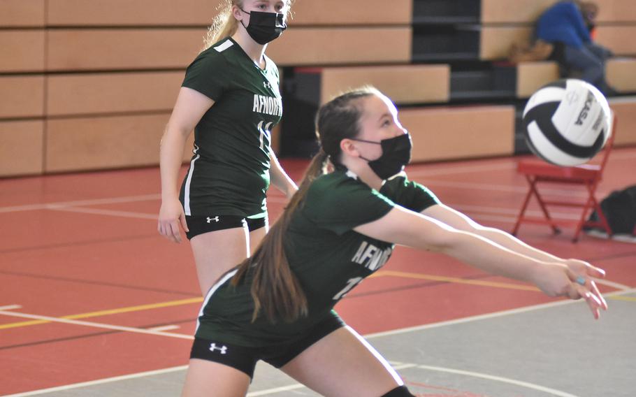 AFNORTH's Victoria Morris watches teammate Isabella Guest bump the ball during round-robin play at the DODEA-Europe Division III volleyball tournament on Friday, Oct. 29, 2021, at Kaiserslautern, Germany.