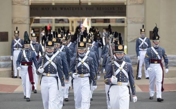 The Corp of Cadets march out of the barracks in May for a change-of-command ceremony at Virginia Military Institute in Lexington. MUST CREDIT: Photo for The Washington Post by Parker Michels-Boyce