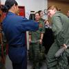 Hed: Not your average summer cruise, 2009

Naval Air Facility Atsugi, Japan, June 2, 2009: A sailor from Helicopter Anti-Submarine Squadron Light 51 helps midshipmen Monica Cooney, right, and Christi Morrissey get into their flight gear before a training flight at Naval Air Facility Atsugi. The two women are in Japan as part of a four-week summer training cruise. The two Navy Reserve Officers’ Training Corps candidates are from University of Michigan and Harvard, respectively.

Read about the NROTC's Summer Training Cruise here.
https://www.stripes.com/news/2009-06-06/midshipmen-make-most-of-summer-cruise-1944357.html1

META TAGS: U.S. Naval Academy, Naval Reserve Officers' Training Corps; NROTC; U.S. Navy; 