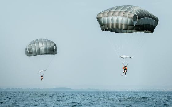 U.S. paratroopers practice jumping into water at Lake Garda in Italy on April 10, 2025. The skill helps them deploy to areas where traditional drop zones are unavailable.