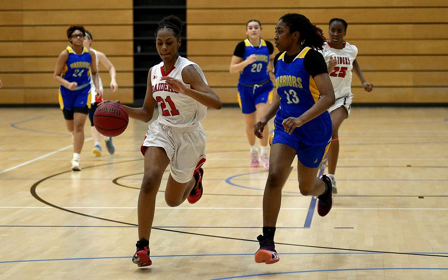 Hazel Sanders dribbles.