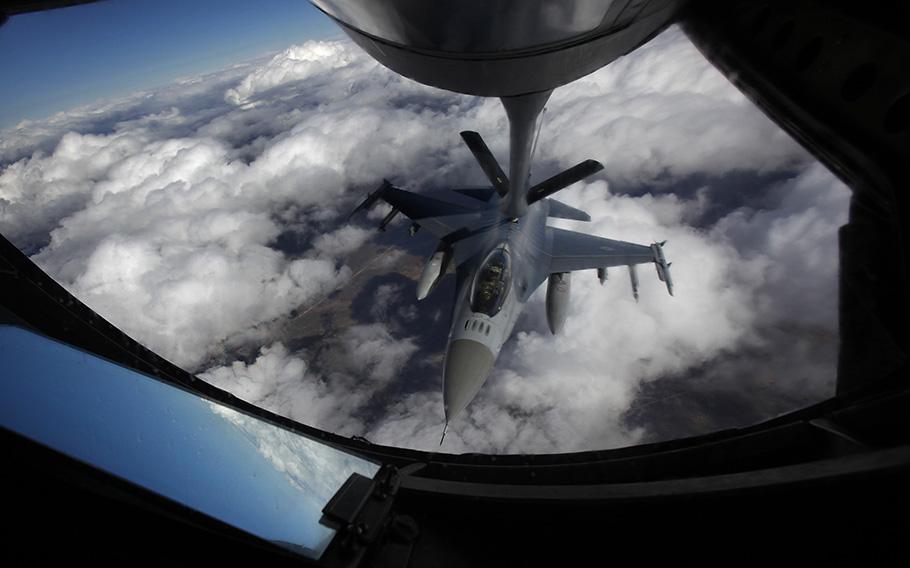 A U.S. Air Force F-16 refuels in mid-flight from a KC-135 Stratotanker during a Red Flag exercise over The Nevada Test and Training Range on Feb. 10, 2014. President Joe Biden on Friday, May 19, 2023, endorsed plans to train Ukrainian pilots on U.S.-made F-16 fighter jets.