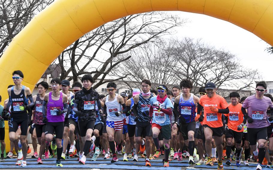 Runners participate in a half-marathon during the 42nd annual Yokota Striders Frostbite Road Race at Yokota Air Base, Japan, Sunday, Jan. 22, 2023.