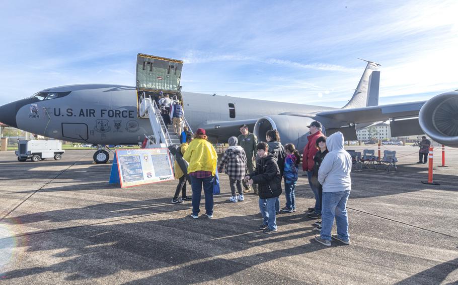 Visitors to the Beyond the Horizon Air and Space Show explore the KC-135 Stratotanker static display at Maxwell Air Force Base, Ala., Saturday, April 6, 2024.