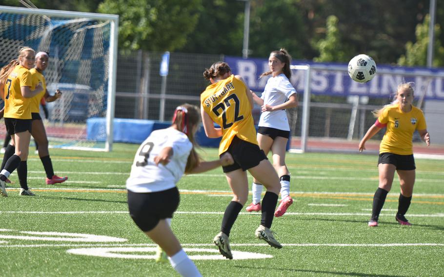 Stuttgart's Norah Hightower avoids a kick from Kaiserslautern's Lola Wesseler that sailed to the right of the goal Tuesday, May 20, 2025, at the DODEA-Europe Division I girls soccer championships at Ramstein Air Base, Germany.