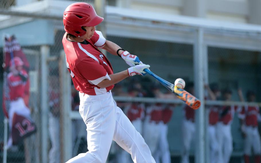 Shobu Deeter hits the ball.
