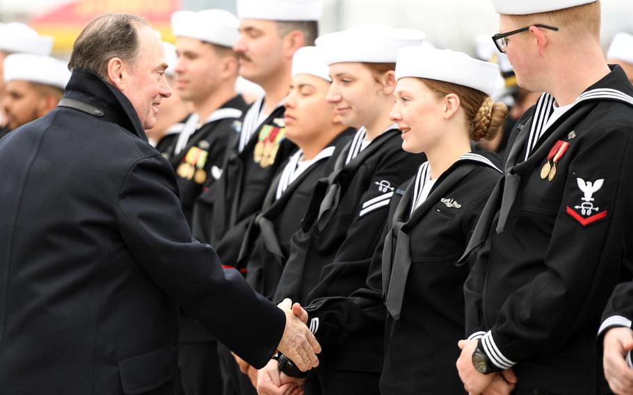 Sailors shake hands with Secretary of the Navy John Phelan