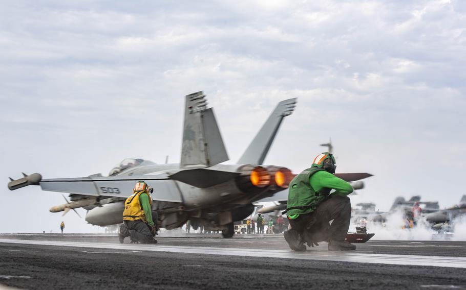 An E/A-18G Growler launches off of the flight deck of the Nimitz-class aircraft carrier USS Dwight D. Eisenhower in the Red Sea on March 23, 2024. The Eisenhower Carrier Strike Group was deployed to the U.S. 5th Fleet area of operations to support maritime security and stability in the Middle East region.