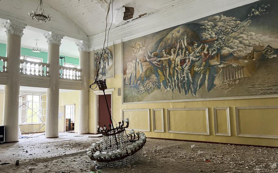 Damage from Russian shelling sits in the Rubizhne Cultural Palace, which is acting as a shelter for roughly a dozen people, in Rubizhne, Ukraine, Tuesday, April 20, 2022.