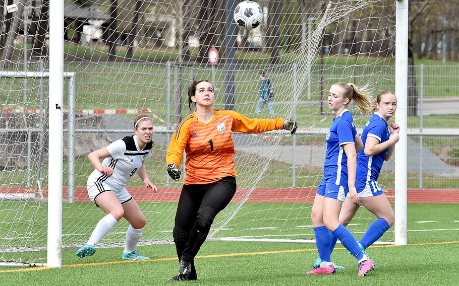 SHAPE goalkeeper Sofia Tryon chases down a ball off a corner kick during a match against Ramstein on April 5, 2024, at Ramstein High School on Ramstein Air Base, Germany.