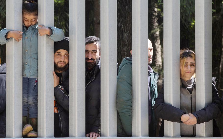 Members of a group of some 30 migrants in Bialowieza, Poland, in May 2023. They were seeking asylum.