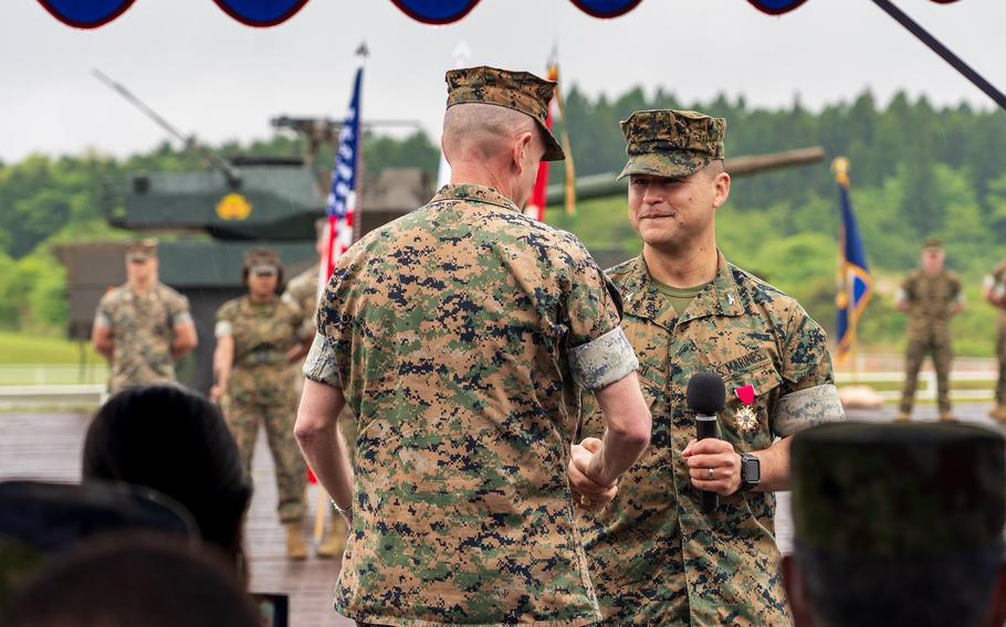 Marine Col. Neil Owens, left, relieves Col. Robert Bodisch as commander of Combined Arms Training Center Camp Fuji, Japan, Tuesday, May 17, 2022. 
