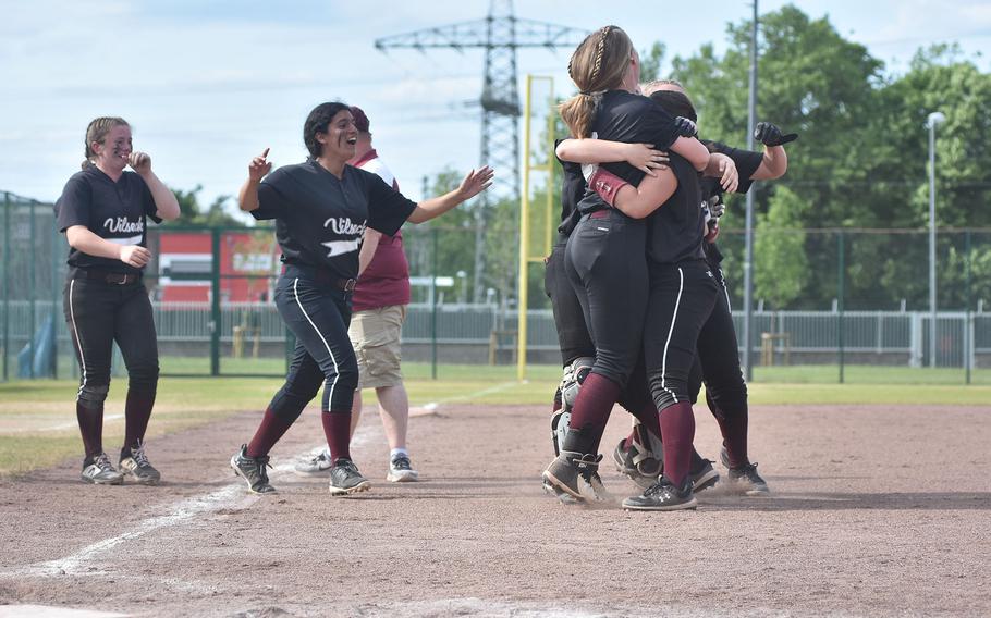 The Vilseck Falcons celebrate after winning the DODEA-Europe Division I softball championship on Saturday, May 21, 2022, at Kaiserslautern, Germany.