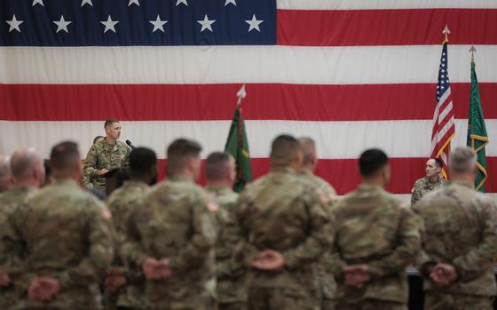 Washington National Guard Soldiers with the 506th Military Police Detachment, 420th Chemical Battalion, 96th Troop Command, case the unit colors during a ceremony on Joint Base Lewis-McChord, Wash., Oct. 29, 2023. The detachment is deploying to Jordon in support of Operation Spartan Shield. (U.S. Army National Guard photo by Staff Sgt. Adeline Witherspoon)