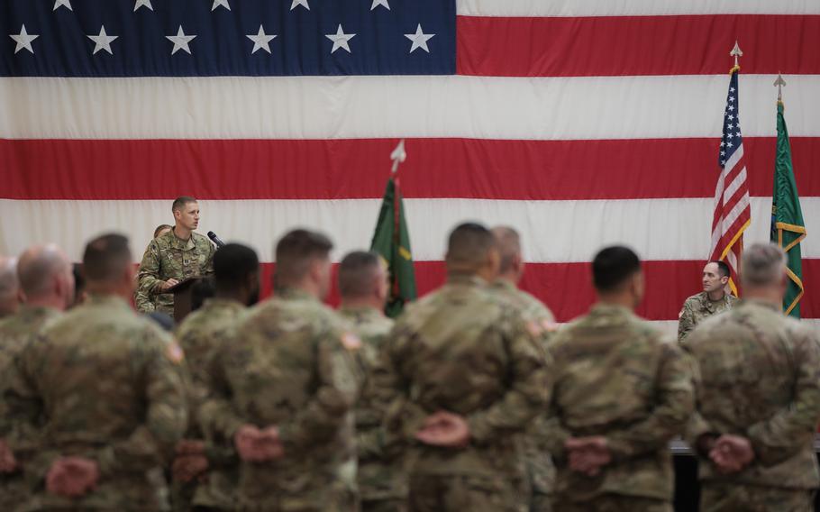Washington National Guard soldiers with the 506th Military Police Detachment, 420th Chemical Battalion, 96th Troop Command, case the unit colors during a ceremony on Joint Base Lewis-McChord, Wash., Oct. 29, 2023. The detachment is deploying to Jordon in support of Operation Spartan Shield.
