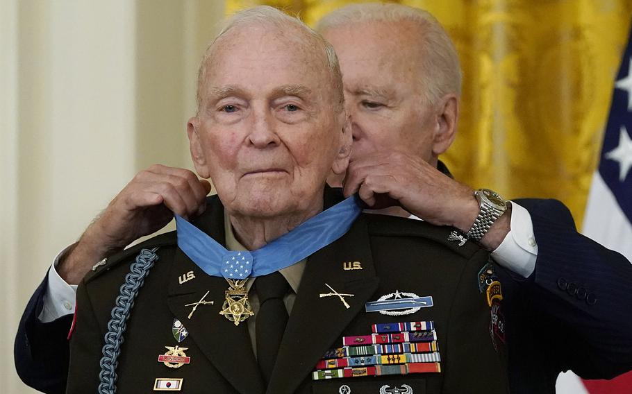 President Joe Biden presents the Medal of Honor to retired U.S. Army Col. Ralph Puckett, in the East Room of the White House, Friday, May 21, 2021, in Washington. 