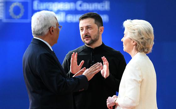European Council President Antonio Costa (L) and European Commission President Ursula von der Leyen (R) greet Ukraine’s President Volodymyr Zelensky