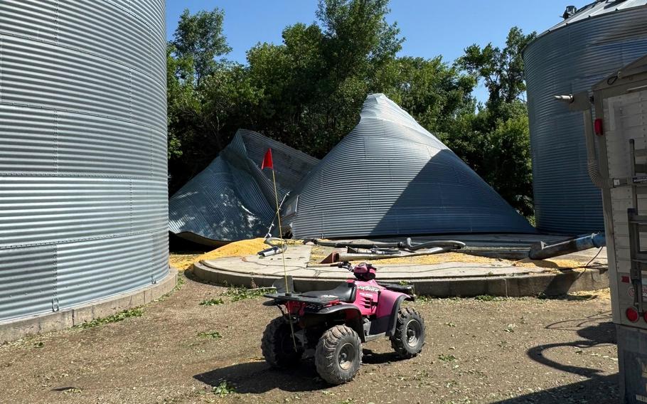 A pink motor vehicle on a farm