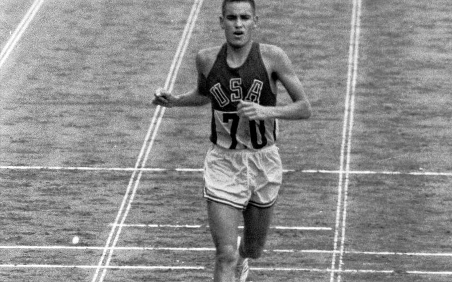 Marine Corps Lt. Billy Mills finishes 14th in the marathon at the 1964 Tokyo Olympics. Days earlier, he beat 37 of the world's top endurance racers for the gold medal in the 10,000 meters with a record time of 28 minutes, 24.4 seconds.