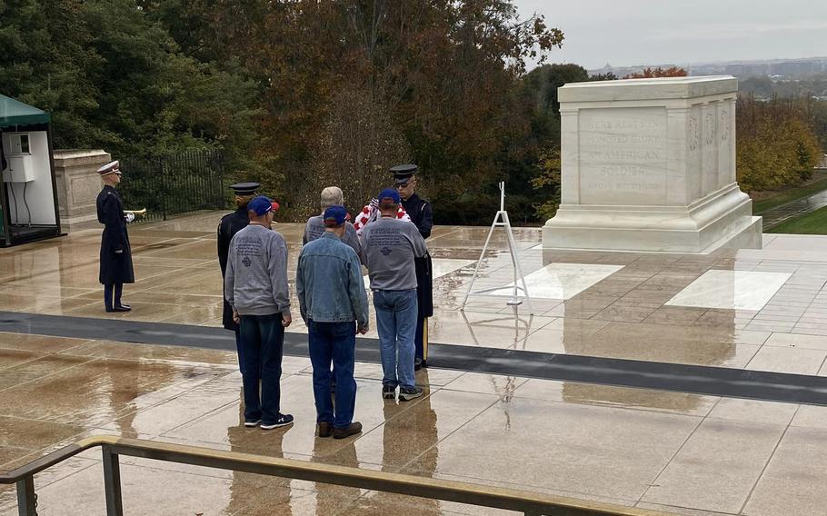 Veterans with the USD 252 Honor flight from Lyon County, Kan., present a wreath at the Tomb of the Unknown Soldier in Arlington National Cemetery on Monday, Oct. 31, 2022.