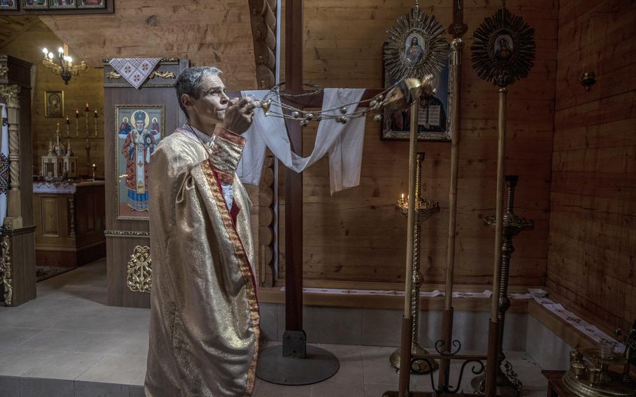 Father Vitalii Kester during Sunday morning Mass. 