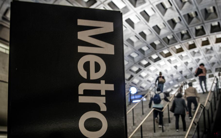 Passengers climb the steps at the Metro Center station in Washington, D.C. A new report from Metro’s inspector general says a personal computer in Russia was used to breach Metro’s computer network earlier this year. 