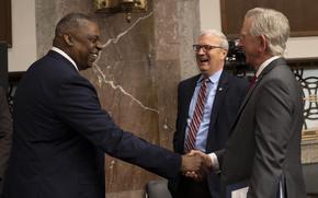 Secretary of Defense Lloyd J. Austin III greets Senators Tommy Tuberville and Kevin Cramer before a Senate Armed Services Committee hearing on the Defense Department’s fiscal year 2023 budget request, Washington, D.C., April 7, 2022. (DoD photo by Lisa Ferdinando)
