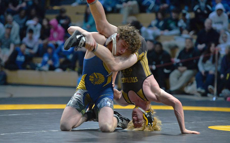 Wiesbaden’s Linx Lawless defeated Stuttgart’s Nicholas Ellinger in the 132-pound championship match at the DODEA-Europe wrestling finals in Wiesbaden, Germany, Feb. 11, 2023. 