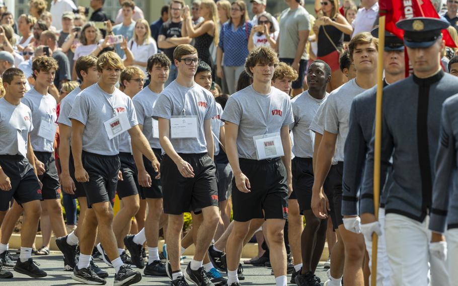 Freshmen at the Virginia Military Institute — known on campus as “rats” — march up to the student barracks Saturday, Aug. 19, 2023, on Matriculation Day, after taking the cadet oath. They wear tags identifying their names and which company they belong to as part of VMI’s Corps of Cadets. 
