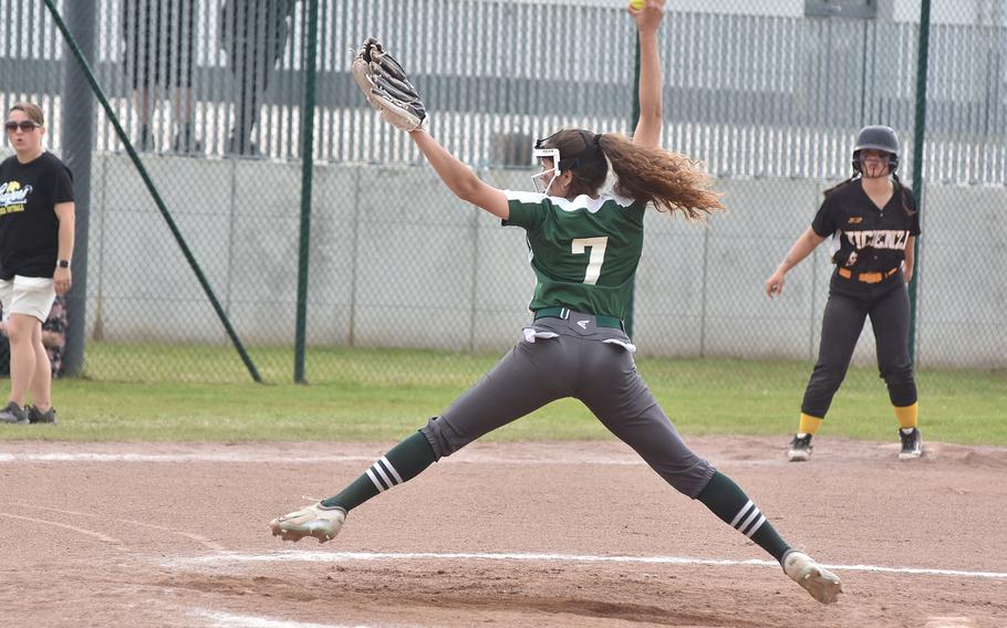 Naples freshman Kapriana Martinez goes airborne during her pitching motion in the DODEA-Europe Division II/III softball championship game Saturday, May 20, 2023, at Kaiserslautern, Germany.