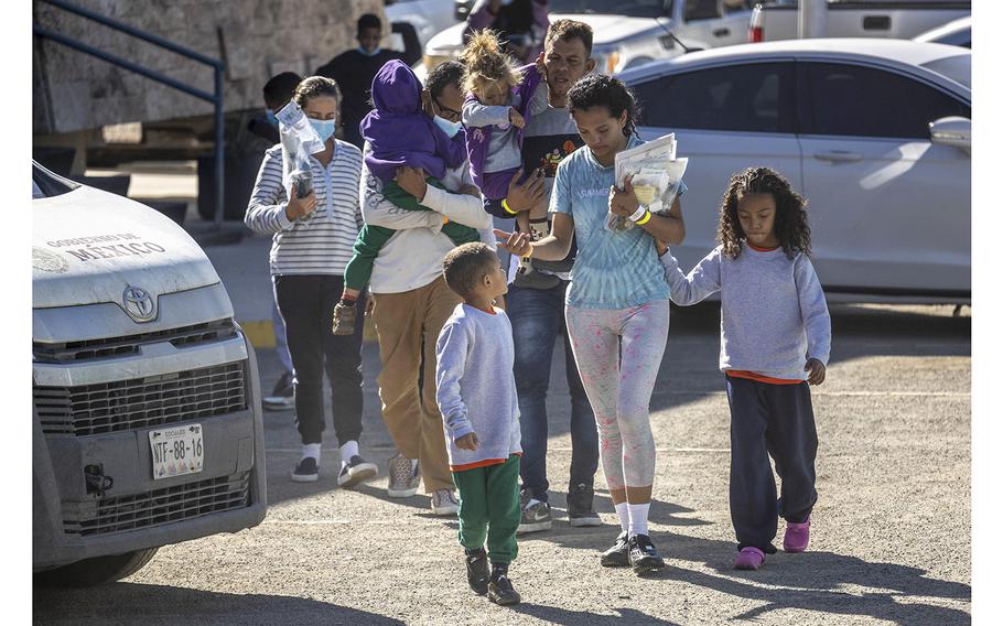 Immigrant families from Venezuela arrive back into Mexico after being expelled from the United States to Ciudad Juarez, Mexico, on Jan. 9, 2023, . 