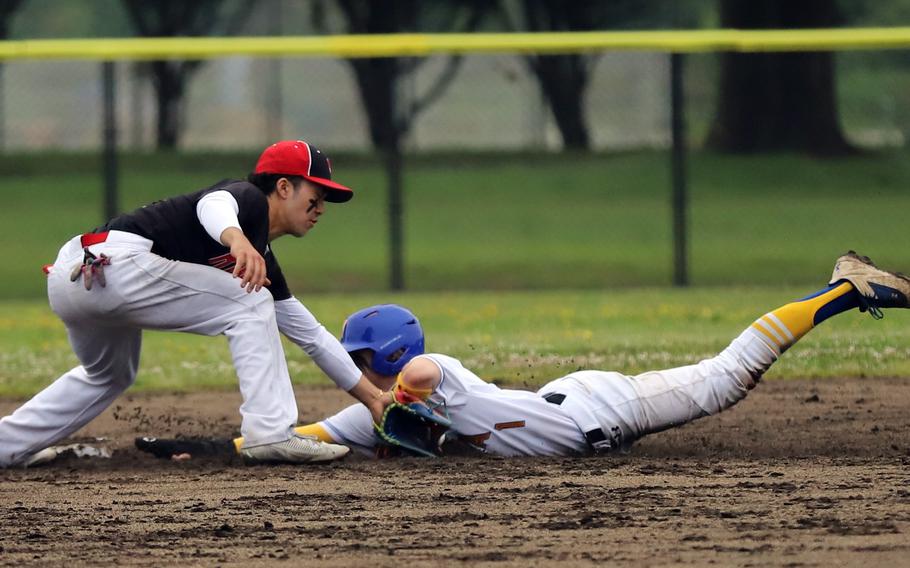 Joshua Low slides into second.