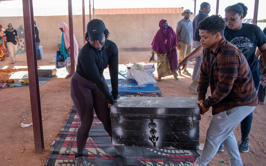 U.S. Air Force members help set up the women’s bazaar Dec. 2, 2023, at Base 201 in Agadez, Niger. Service members interacted with vendors to learn more about their culture and make purchases in support of the local economy.