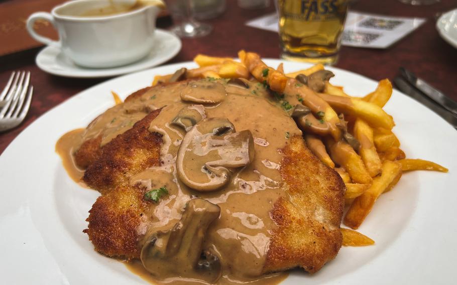 A traditional Jaeger schnitzel with fries at the Duerkheim Giant Barrel in Bad Duerkheim, Germany. The restaurant is not just a tourist gimmick. It serves generous helpings of well-executed traditional fare.
