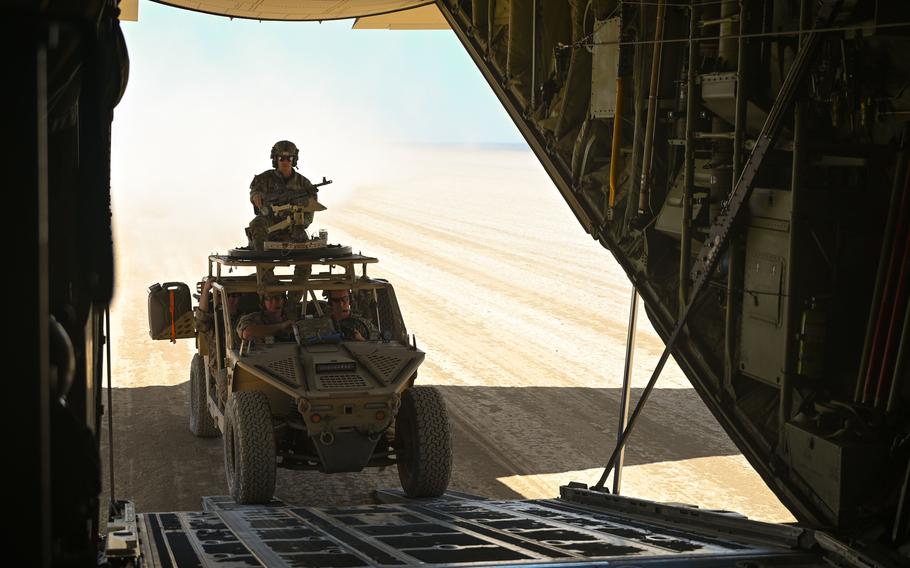 Pararescuemen assigned to the 82nd Expeditionary Rescue Squadron drive a tactical vehicle onto a C-130J Super Hercules during a rapid medical evacuation training exercise in Djibouti, April 7, 2021. In late December 2022, U.S. Air Force pararescue troops and other quick reaction forces launched an early morning rescue operation in the Horn of Africa that saved two people.