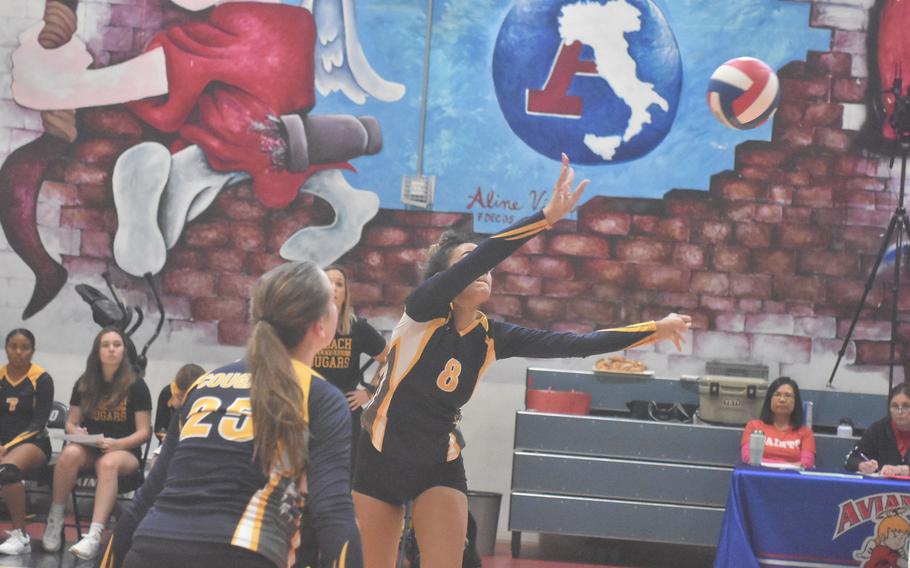 Ansbach's Laila McIntyre pushes the ball over the net Saturday, Oct. 15, 2022, in a match against the Aviano Saints.