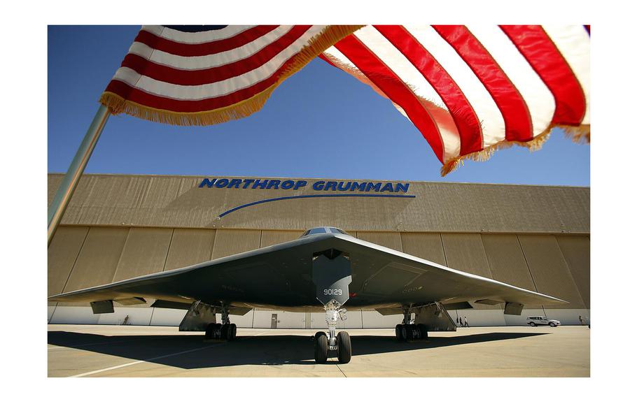 The US flag flies near the U.S. Air Force's B-2 Spirit Stealth bomber "Spirit of Georgia" at the Northrop Grumman Corp. facility at U.S. Air Force Plant 42 in Palmdale on July 17, 2014. 