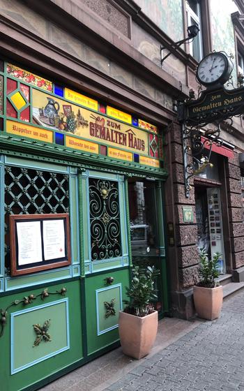 The main entrance to the popular apple wine tavern Zum Gemalten Haus on Schweitzer Strasse in the Sachsenhausen district of Frankfurt, Germany.