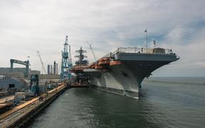 The USS George Washington. The Navy’s two top officials visited the ship Washington to hear from sailors about living and working conditions while the ship is in Newport News Shipbuilding for its overhaul and refueling.