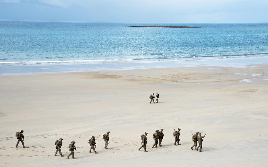 Talisman Sabre troops cross Langham Beach during an amphibious landing near Stanage Bay, Australia, Wednesday, Aug. 2, 2023. 