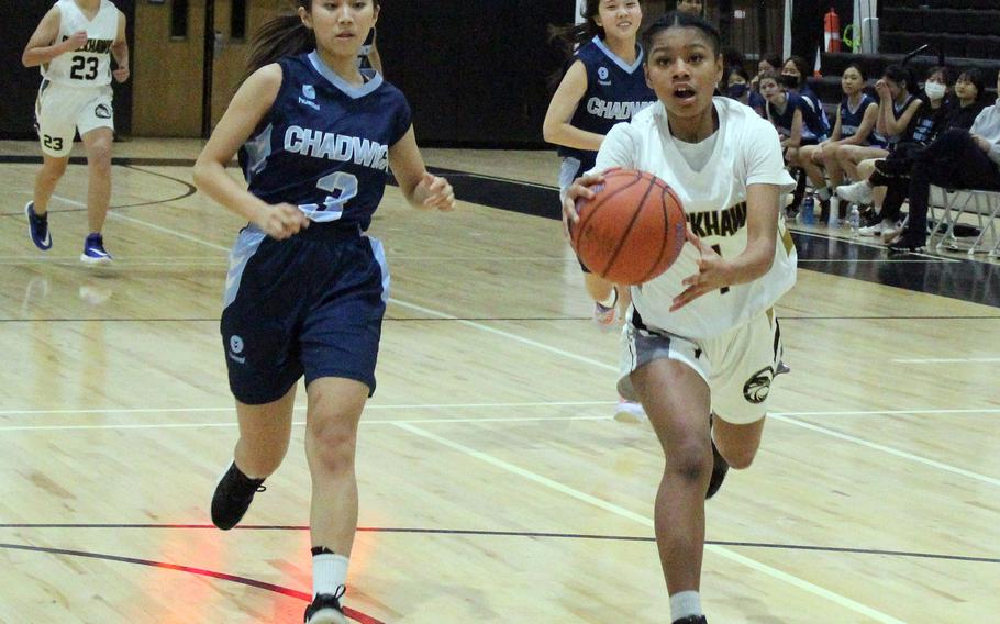 Humphreys' Anayah Reyes drives upcourt against Chadwick during Wednesday's Korea girls basketball game. The Blackhawks won 55-9.